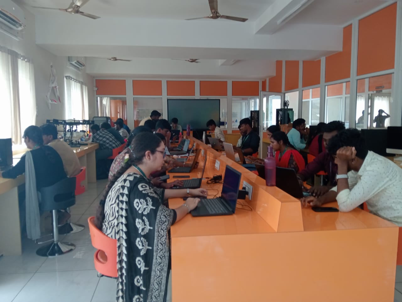 On a Blue background, a Wacom and a mouse.