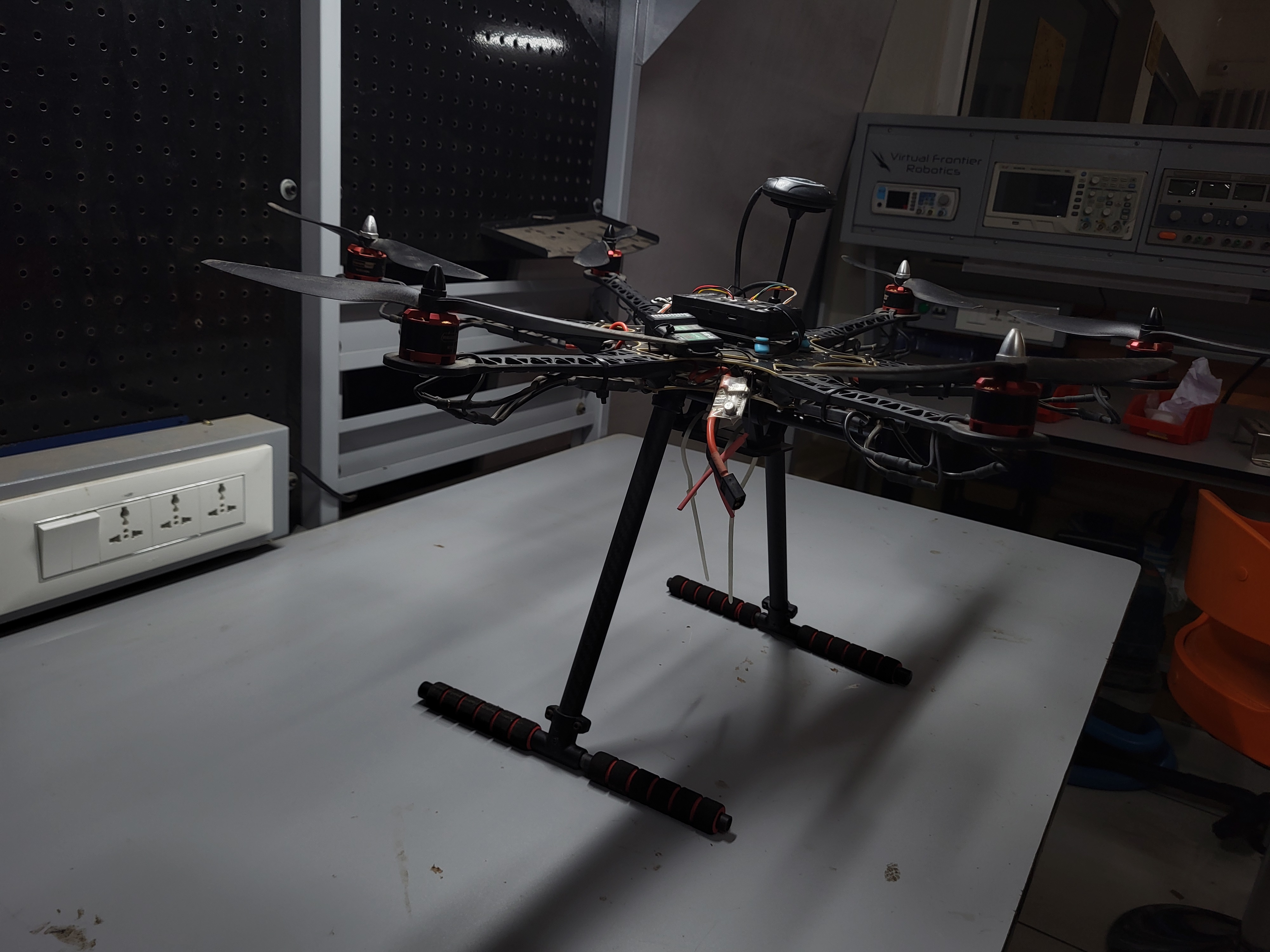 On a Blue background, a Wacom and a mouse.